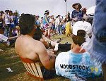 The Ergolife Portable Chair in use at a festival
